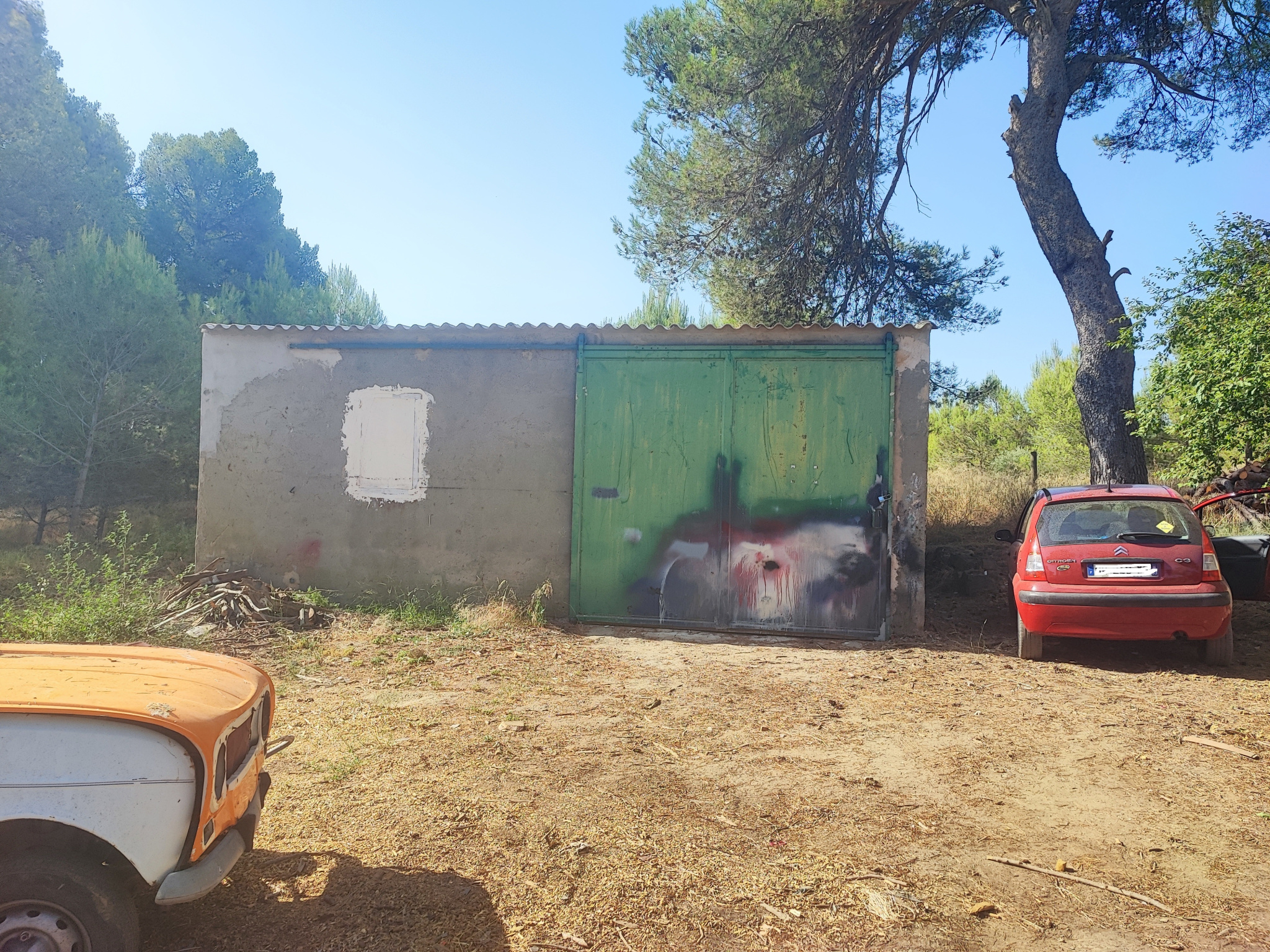 Remise/ Garage avec terrain